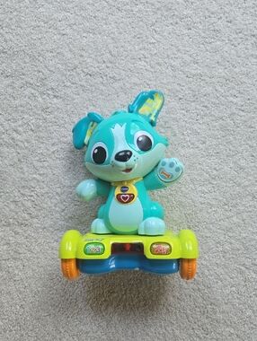 Teal Interactive Puppy Toy with Music and Buttons
